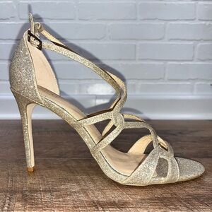 Jewel Badgley Mishka Gold Glitter Heels